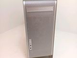 a silver apple mac pro on a white table