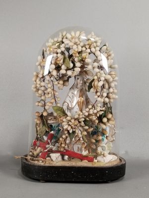 a snow globe with a nativity scene inside of it