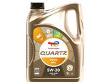 a close up of a bottle of motor oil on a white background