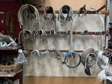 a garage with a lot of tools and tools hanging on the wall