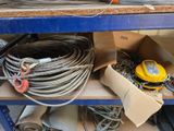 many different types of wires on the shelf