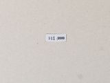 a close up of a piece of paper with a number on it