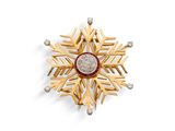 broche en forme de flocon de neige en or et diamants, signée Van Cleef