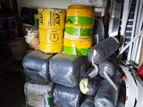 a pile of plastic wrapped up and stacked on top of each other