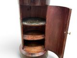 a wooden cabinet with a marble top and a door open