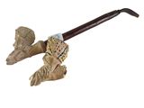 an image of a pipe with a wooden handle and a wooden handle