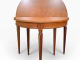 a round table with a wooden top and legs