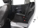 two seats in the back of a car that is empty