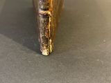 a close up of a metal object on a table
