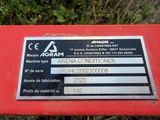 an image of a red box with a sign on it that says acram