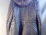 black quilted jacket with faux fur collar and hood
