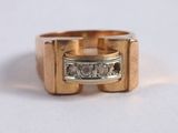 an image of a gold ring with diamonds on it