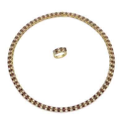 a diamond and gold necklace and ring set