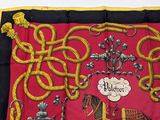 a picture of a red and black banner with a horse and carriage