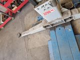 a machine that is sitting on the ground in the garage