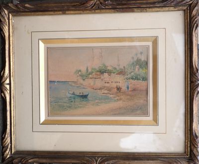 tableau encadré représentant une scène de plage avec un bateau dans l'eau