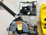 two tools that are on a table in a room