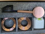 an image of a set of copper tools in a box