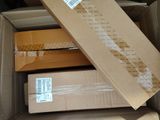a cardboard box with several boxes inside of it