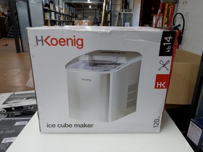 boîte contenant une machine à glaçons, posée sur une table dans un magasin