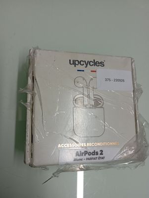 a box of electronics that is wrapped in plastic
