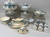 a lot of blue and white dishes and cups and saucers