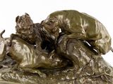 statue of a man and a dog on a rock with a white background