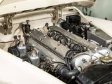 a close up of a car ' s engine with the hood open