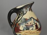 a picture of a vase with a painting on it