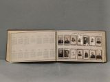 an open book with pictures of people in black and white
