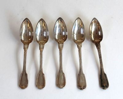 six spoons are lined up in a row on a white surface