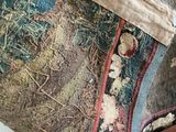 a close up of a purse on a chair