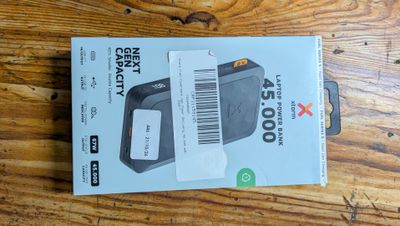 a box with a barcode on it on a wooden table