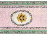 un tapis rose et vert orné d'un motif de tournesol