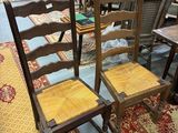 many chairs that are sitting on a rug in a room