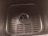 a close up view of a sink with a drain