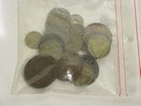 a lot of coins in a bag on the table