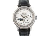 une photo d'une montre-bracelet avec un cadran blanc et un bracelet en cuir noir
