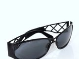 a close up of a pair of sunglasses on a white surface
