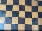 a black and white checkered table top with a black and white checkered table top