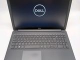 the dell laptop is open and ready to be used