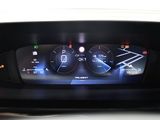 a close up view of a car ' s dashboard with a digital display