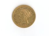 an image of a gold coin with a woman ' s head on it