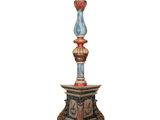 an image of a statue of a bird sitting on top of a table