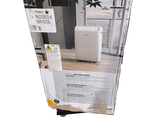 a box with a picture of a refrigerator inside of it