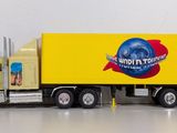 a toy truck that is sitting on the floor