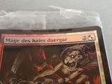 a picture of a card with a picture of a demon on it