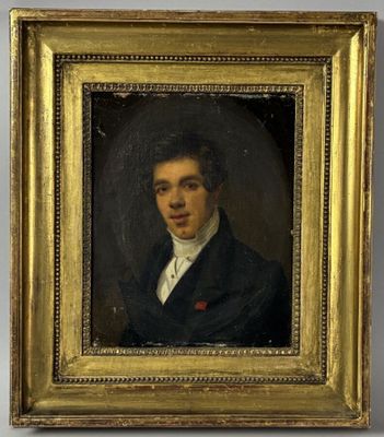 portrait of a young man in a black suit and white shirt