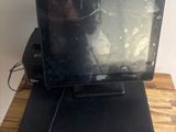 a laptop computer sitting on top of a wooden desk