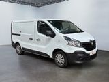 the white van is parked in a large room with white walls